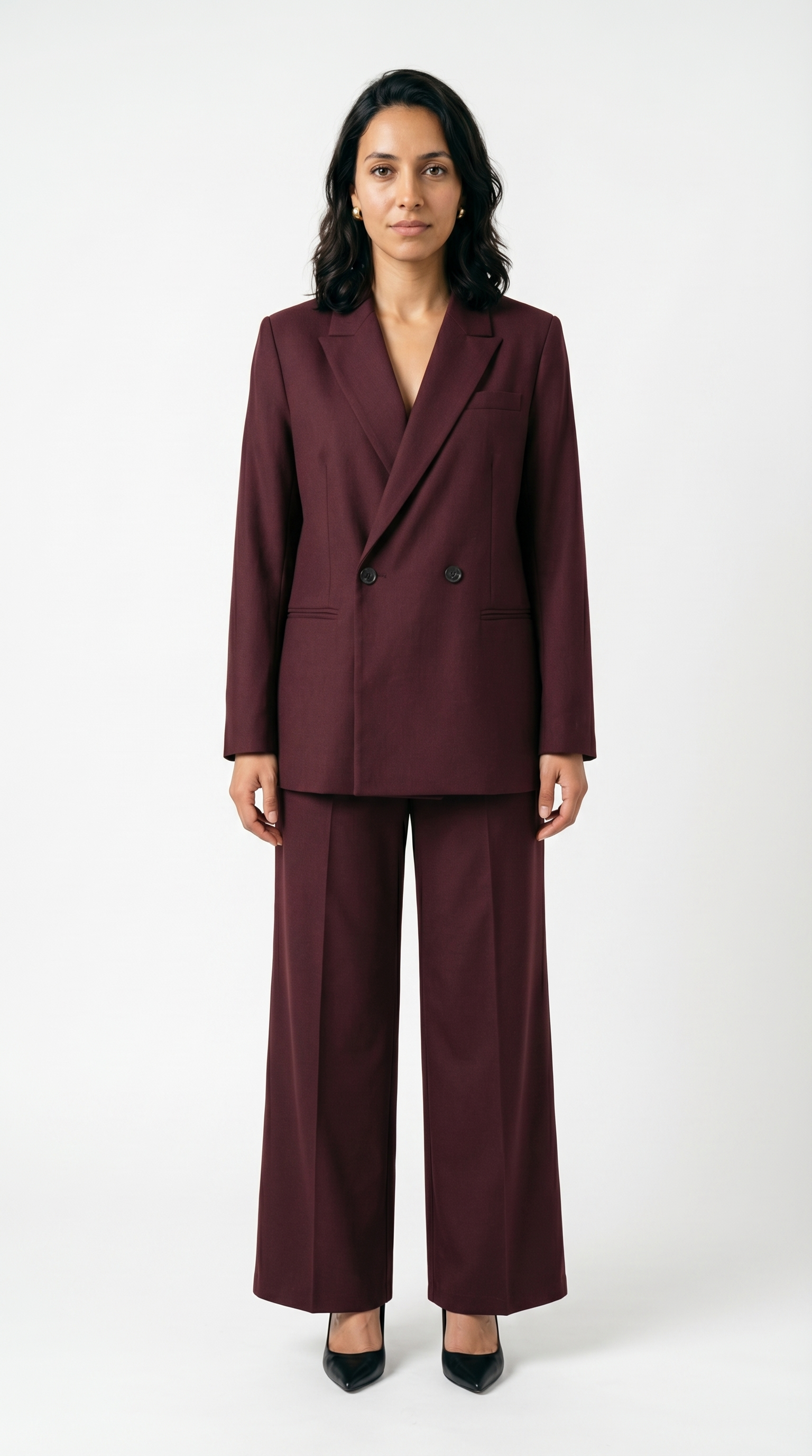 طقم نسائي أنيق – بنطال واسع مع بلوزة عصرية